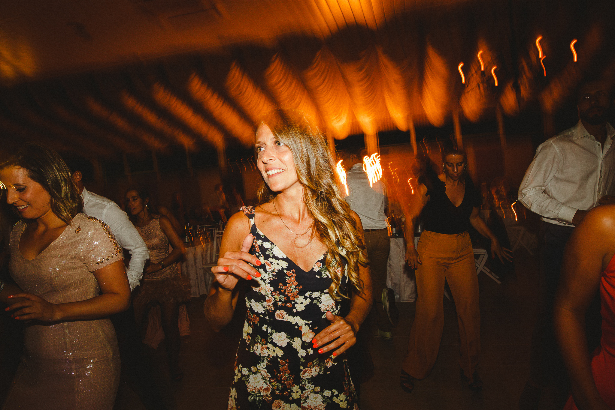 Wedding guests having fun on the dance floor